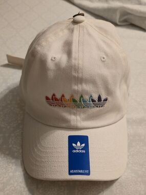 NWT Adidas Originals cap features rainbow-colored embroidered trefoil log.